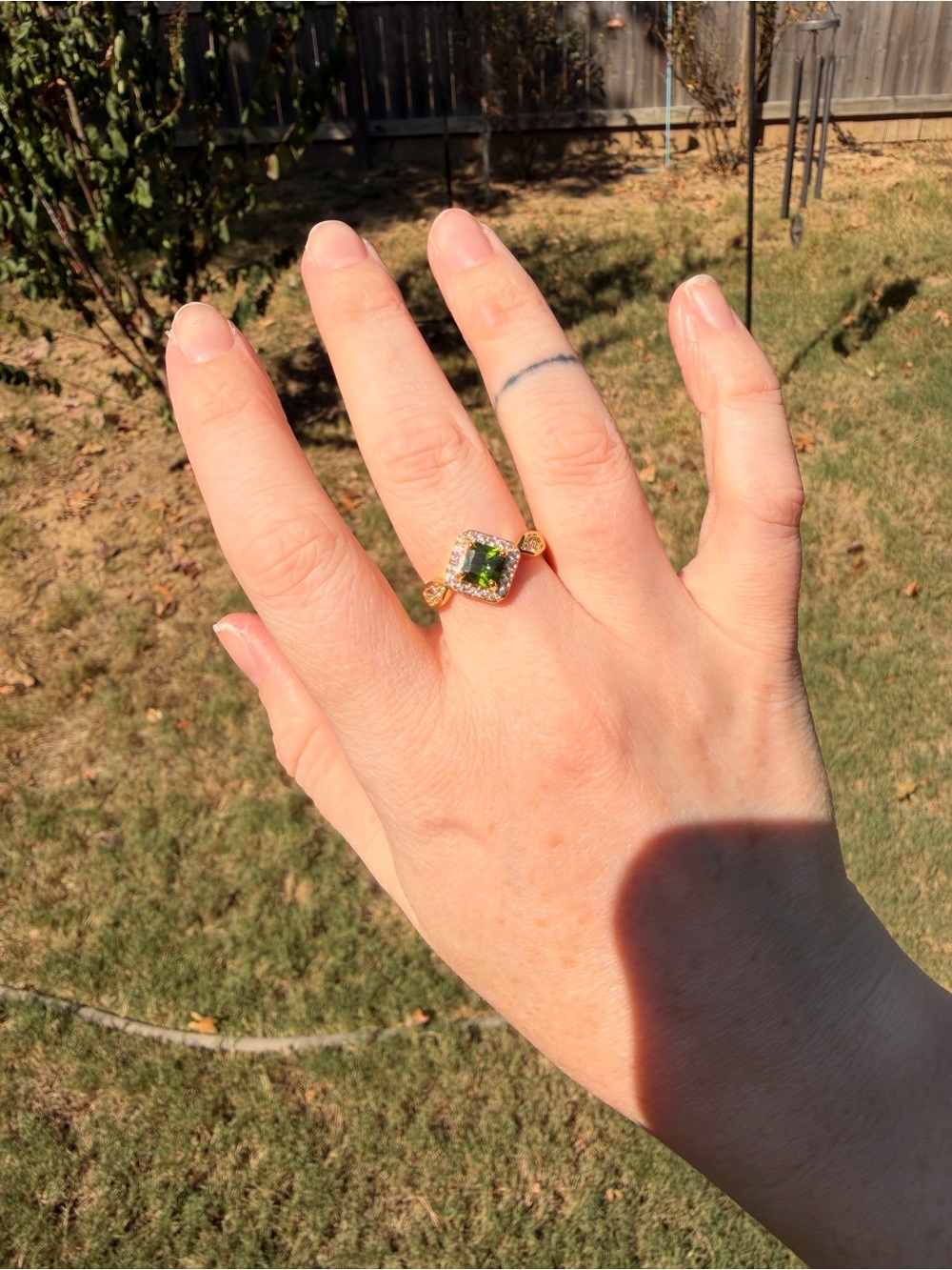 Adjustable Gold Plated Ring with Green Centerstone and Halo Accent